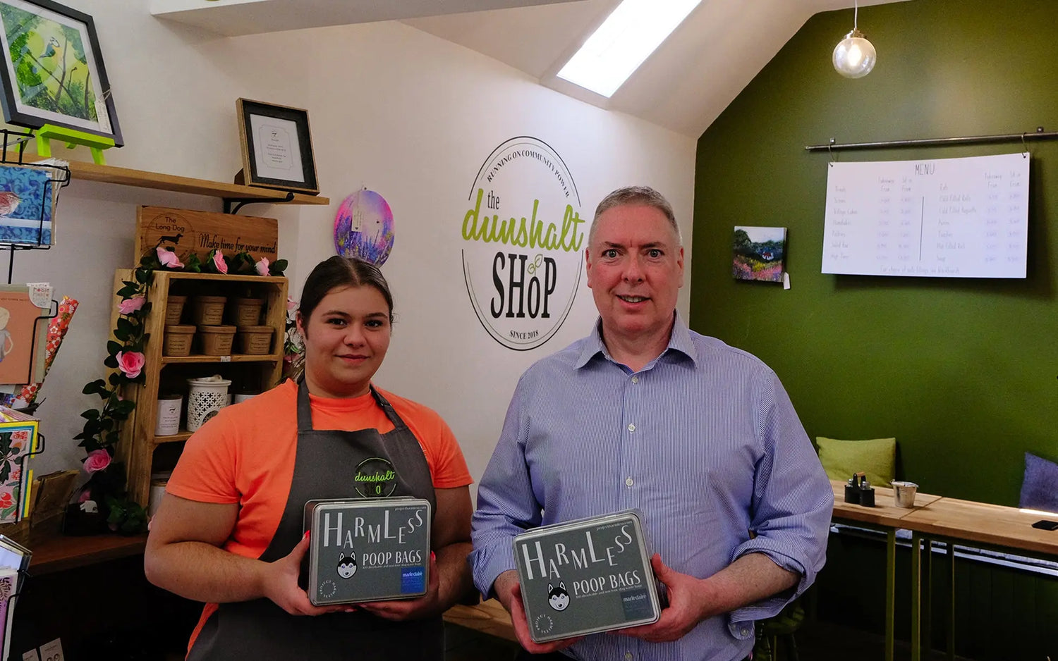 Project Harmless Co-Founder George Greer and a shopkeeper at a community owned shop in a fife village