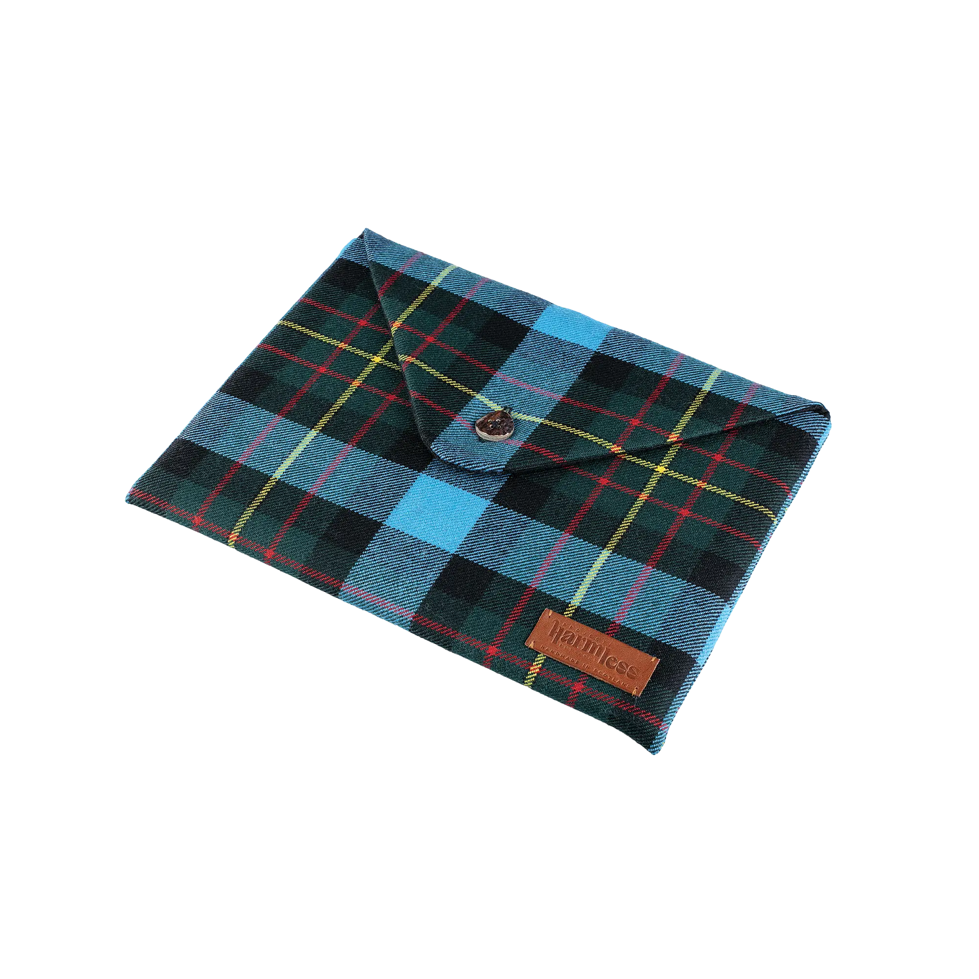 Full view of the Harmless Atelier MacBook Air Case in MacLaren tartan, handcrafted in Scotland by Project Harmless with a timeless heritage-inspired design. It has a leather patch reading ‘Project Harmless - Handmade in Scotland’ in the lower corner.