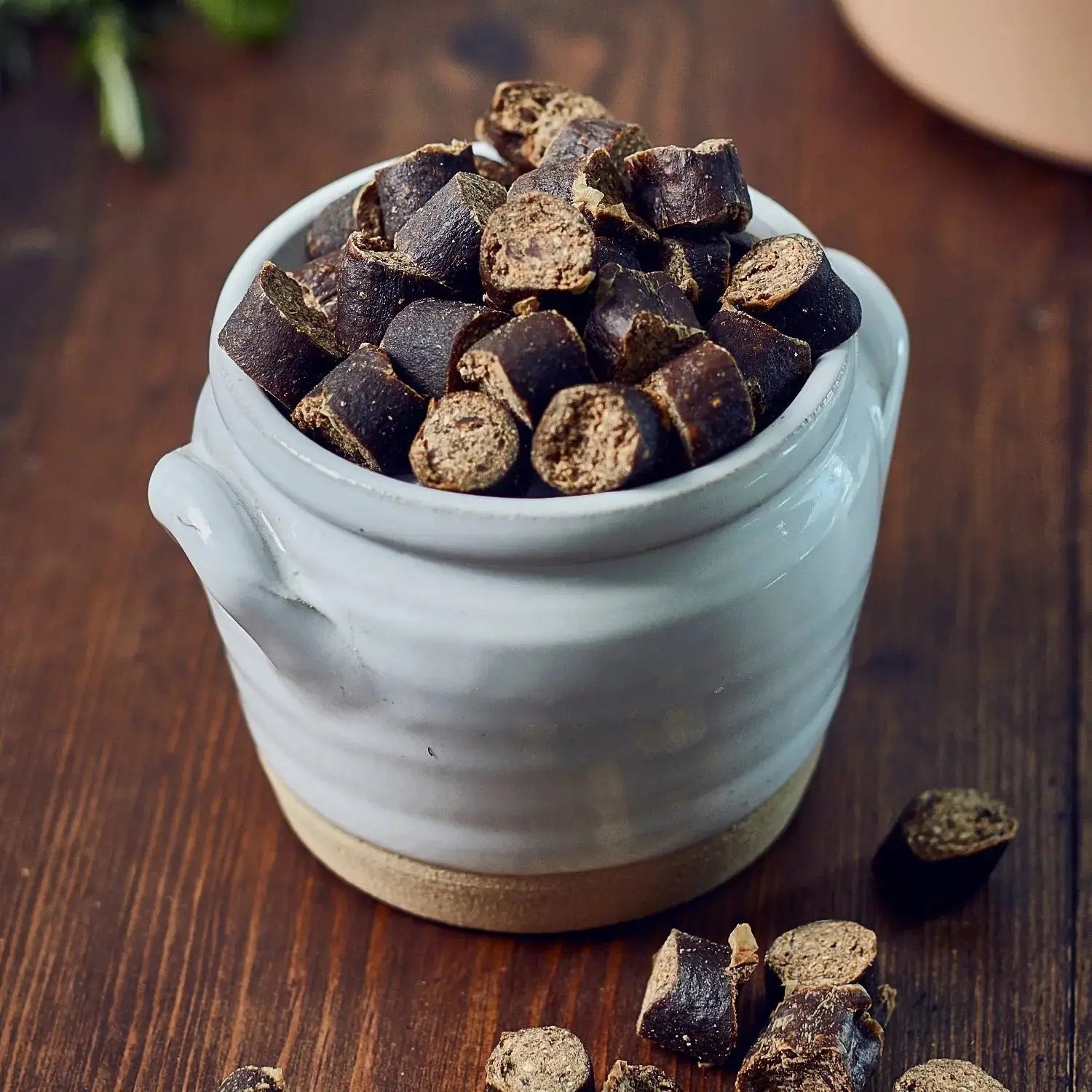 Ceramic container filled with James and Ella air-dried natural dog treats stocked by Project Harmless UK