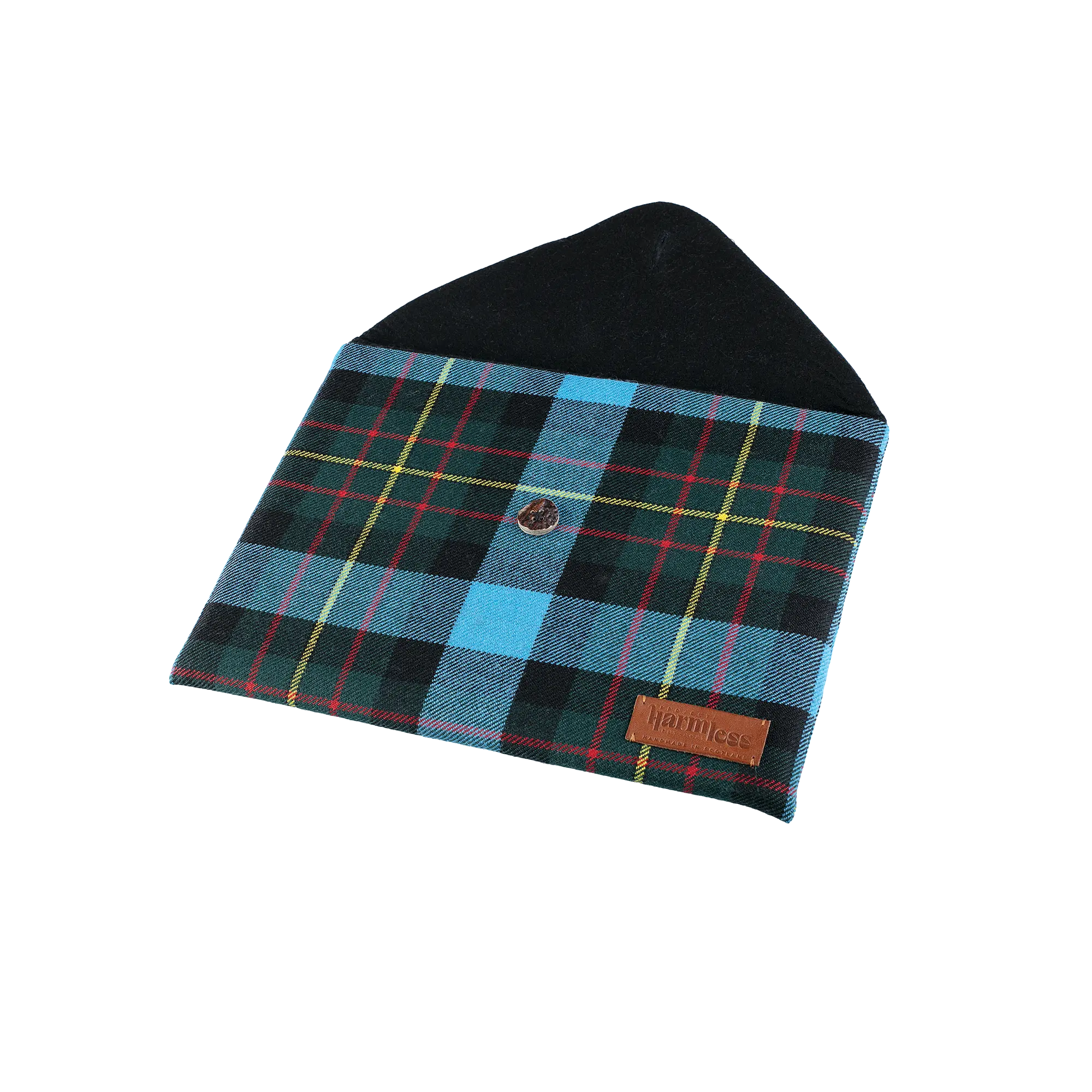 Open view of the Harmless Atelier MacBook Air Case in MacLaren tartan, showcasing the pure wool lining, handcrafted deer antler button closure, and leather patch reading ‘Project Harmless - Handmade in Scotland.’