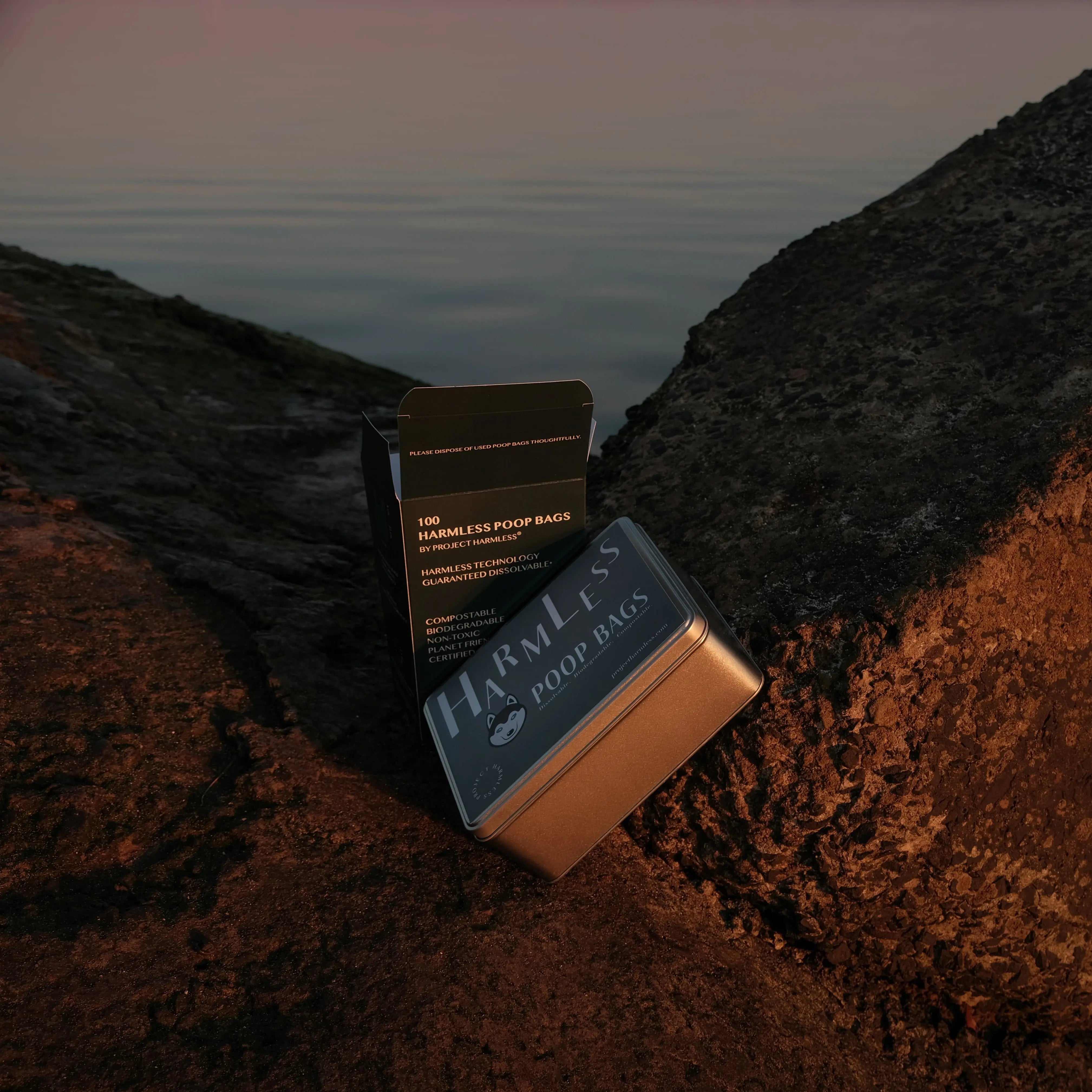 Project Harmless water-reactive dog poop bag tin and refill pack outdoors